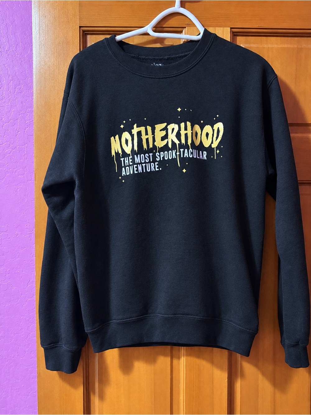 Motherhood Black Crewneck Sweatshirt with Yellow Graphic